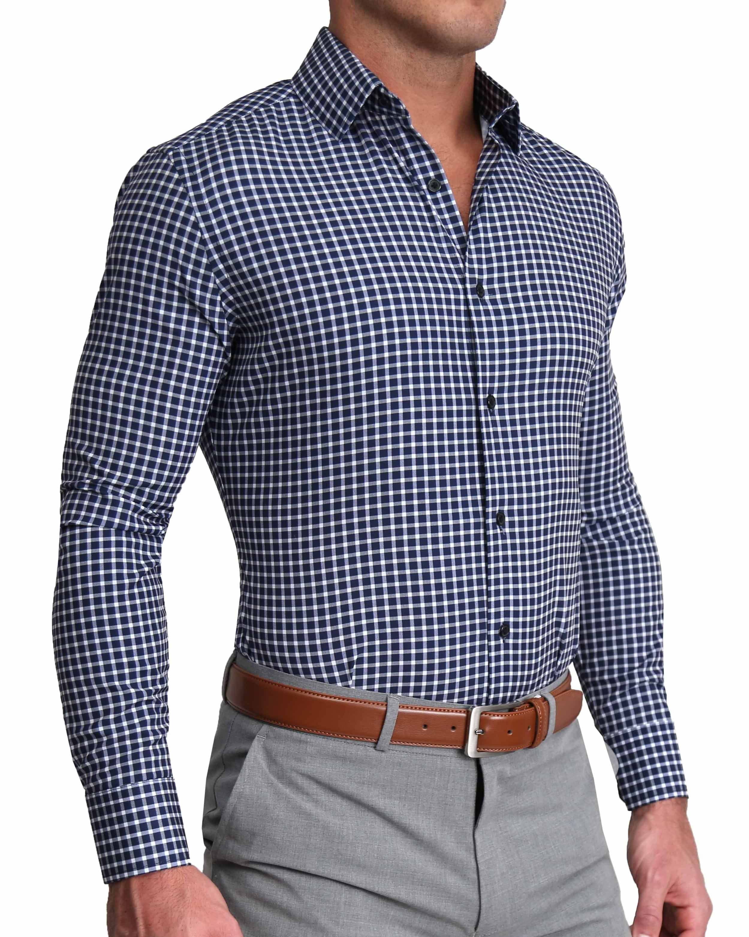 A man wearing a blue and white mini plaid dress shirt with a structured collar and single button cuffs.