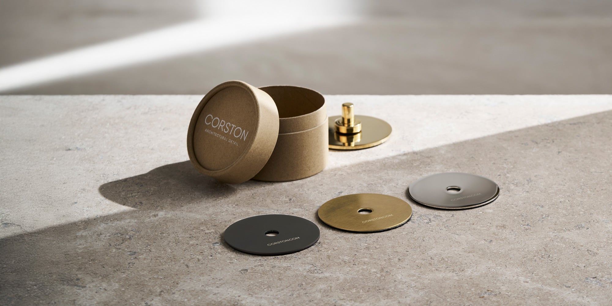 A round cardboard box labeled 