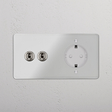Kipphebel 2x & SchuKo-Modul im runden Zweifachrahmen, Nickel poliert und Weiß lackiert auf Strukturwand.