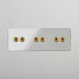 Dreifach-Kipphebelschalter mit sechs Hebeln – Durchsichtig + Antikes Messing – elegante Lichtsteuerungslösung – auf weißem Hintergrund