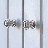 2X Polished Nickel Furniture Knob on White Cupboard