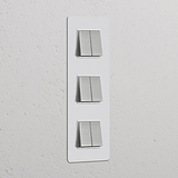 6x Wissel-Wipschakelaar met verticale plaat in overschilderbaar gepolijst nikkelwit, voor drievoudige schakelaars & dimmers.