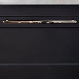 Polished Nickel Milliner Handle on Black Furniture