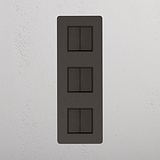 High-Capacity Brons Zwart Drievoudige Vertical wipschakelaar  - Advanced Light Control Accessoire op witte achtergrond