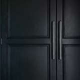 Polished Nickel Sycamore Furniture Handle on black Cupboards