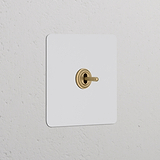 'Bouton Poussoir Trois Positions à Levier en laiton ancien, interrupteur simple avec plaque peignable.'