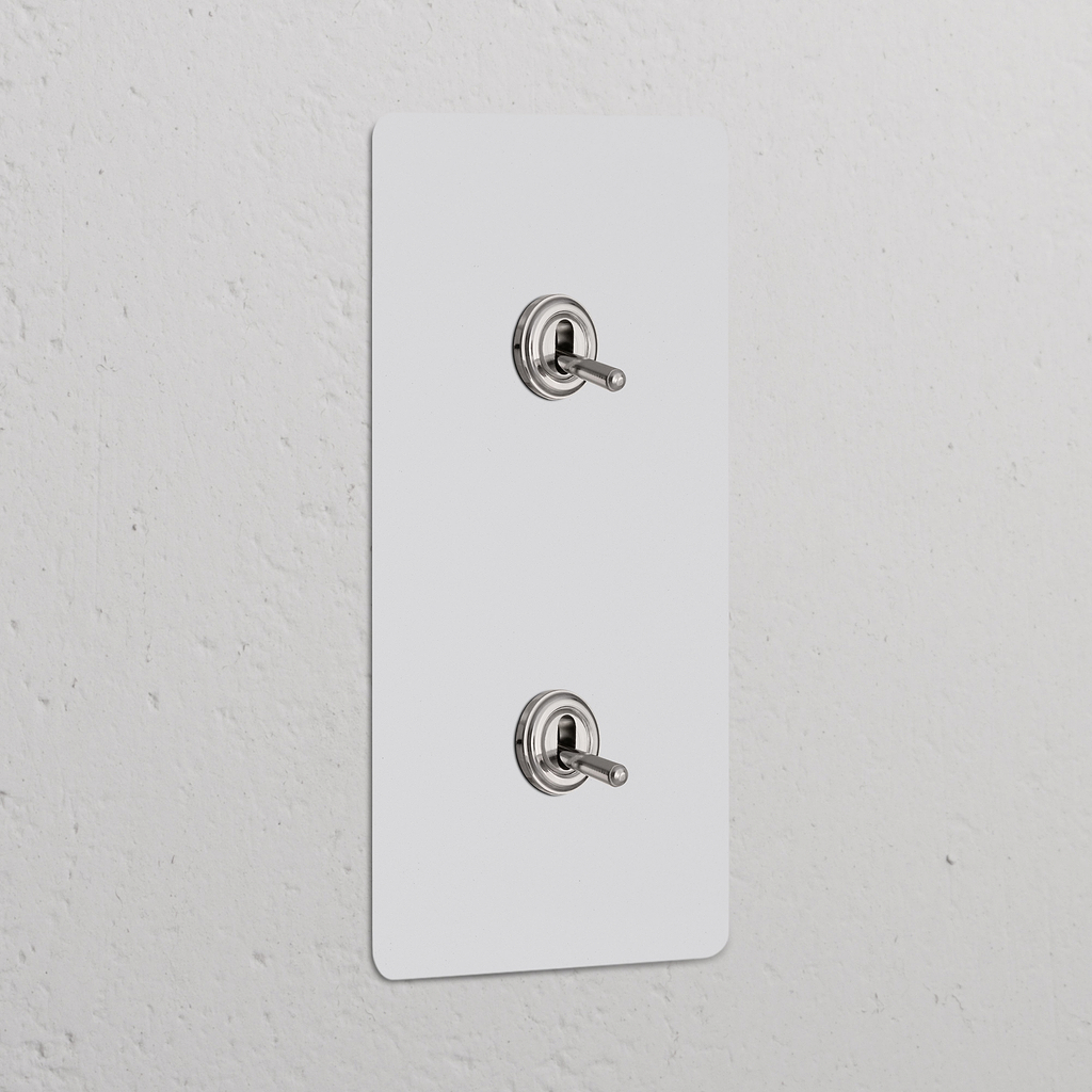 Interrupteur VV à Levier double vertical en Nickel Poli Peignable, Interrupteur VV à Levier x2 avec une conception à double plaque.