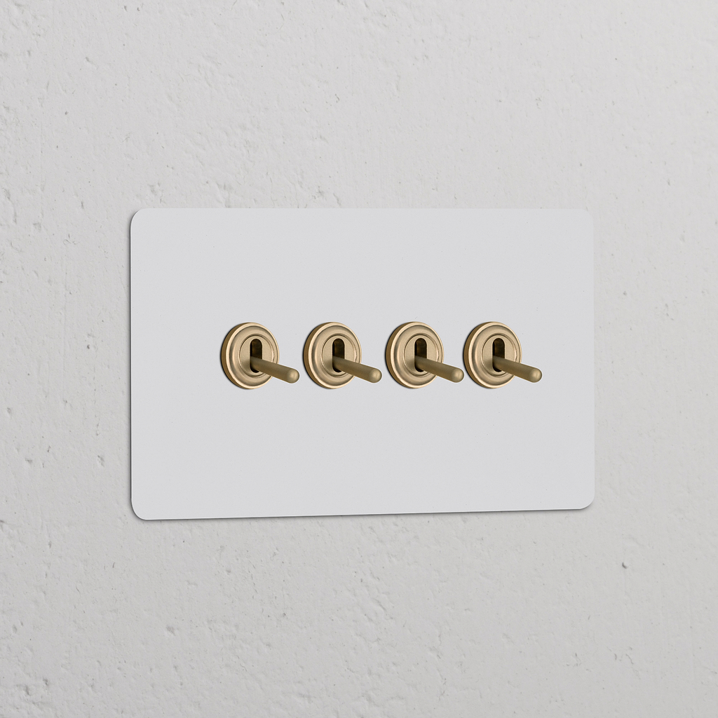 Ensemble de quatre interrupteurs à levier en laiton sur plaque double, finition Laiton Ancien Peignable pour 'Interrupteurs & Variateurs Double'.