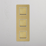Easy-to-Control Vertical Triple Rocker Switch in Antique Brass White on White Background