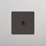 Single Toggle Switch in Bronze on White Background