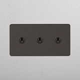 High-Performance Double Toggle Switch in Bronze with 3 Levers on White Background