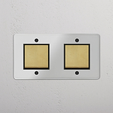 Stylish Double Rocker Switch in Clear Antique Brass Black on White Background