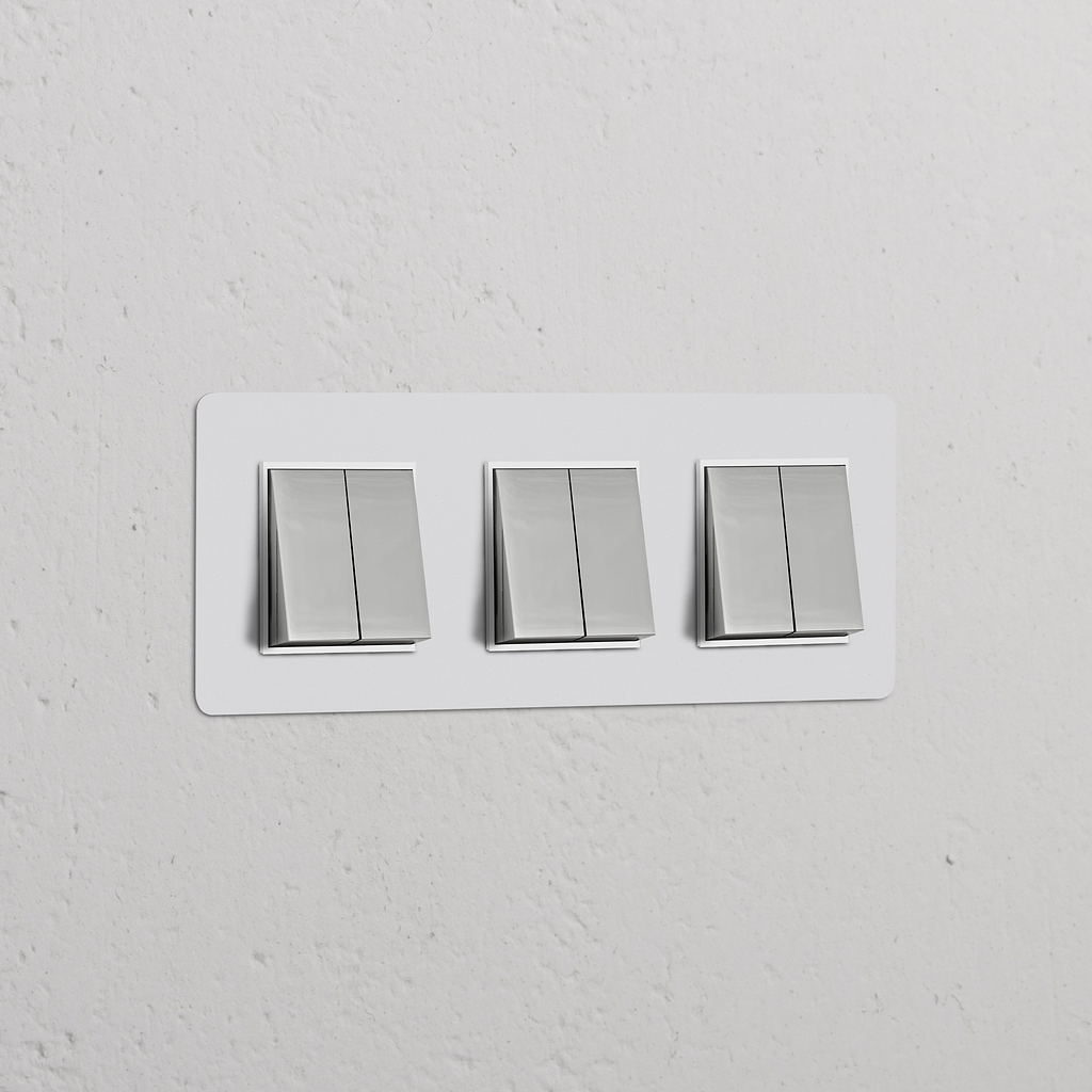 Dreifachrahmen mit 6x Wippschalter; lackierbar, poliertes Nickel, weiß. Ideal für stilvolle Lichtsteuerung.