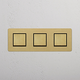 Dreifacher Wippschalter – Antikes Messing + Schwarz – mit drei Positionen – auf weißem Hintergrund