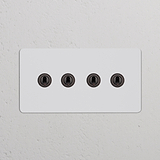 4-fach-Kipphebelschalter in einem lackierbaren Zweifachrahmen, inkl. Dimmer, mit Bronze-Finish-Optionen für Stil und Vielseitigkeit.