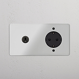 Kipphebel & SchuKo-Modul im Zweifachrahmen rund – Durchsichtig Bronze + Schwarz auf einer weißen Wand, Doppelsteckdosen und Schalter.