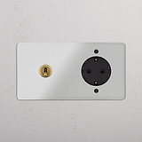 Zweifachrahmen mit Steckdosen und Modulen: Kipphebel & SchuKo-Modul, rundes Design, Messing + Schwarz-Finish.