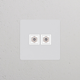 Toma satelital x2 (marco individual), pintable con inserción blanca, para conexiones coaxiales en interiores.