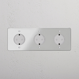 Base de enchufe triple Schuko con marco transparente e inserto blanco, adecuada para conexiones de enchufes múltiples.