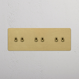 Antique Brass Triple Toggle Switch Designed with Six Levers on White Background