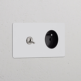 Interrupteur double nickelé et prise ronde Type E, insert noir, style levier sur double plaque.