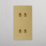 Vertical Design Double Toggle Switch, Four-Switch, Antique Brass on White Background