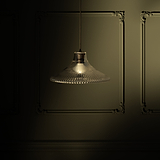 Suspension Hammersmith Grand Format en Verre Cannelé en bronze, projetant une douce lueur sur un mur vert orné.