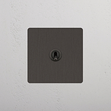 Retractive Bronze Single Toggle Switch - Easy-to-use Light Switch Design on White Background