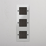 Efficient Vertical Triple Rocker Switch in Clear Bronze Black for Lighting Control on White Background