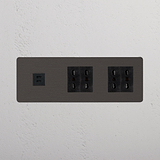 Presa Bronzo Nero con 4 prese Bipasso e Modulo Triplo USB 30W, parte della collezione Triple Prese & Moduli.