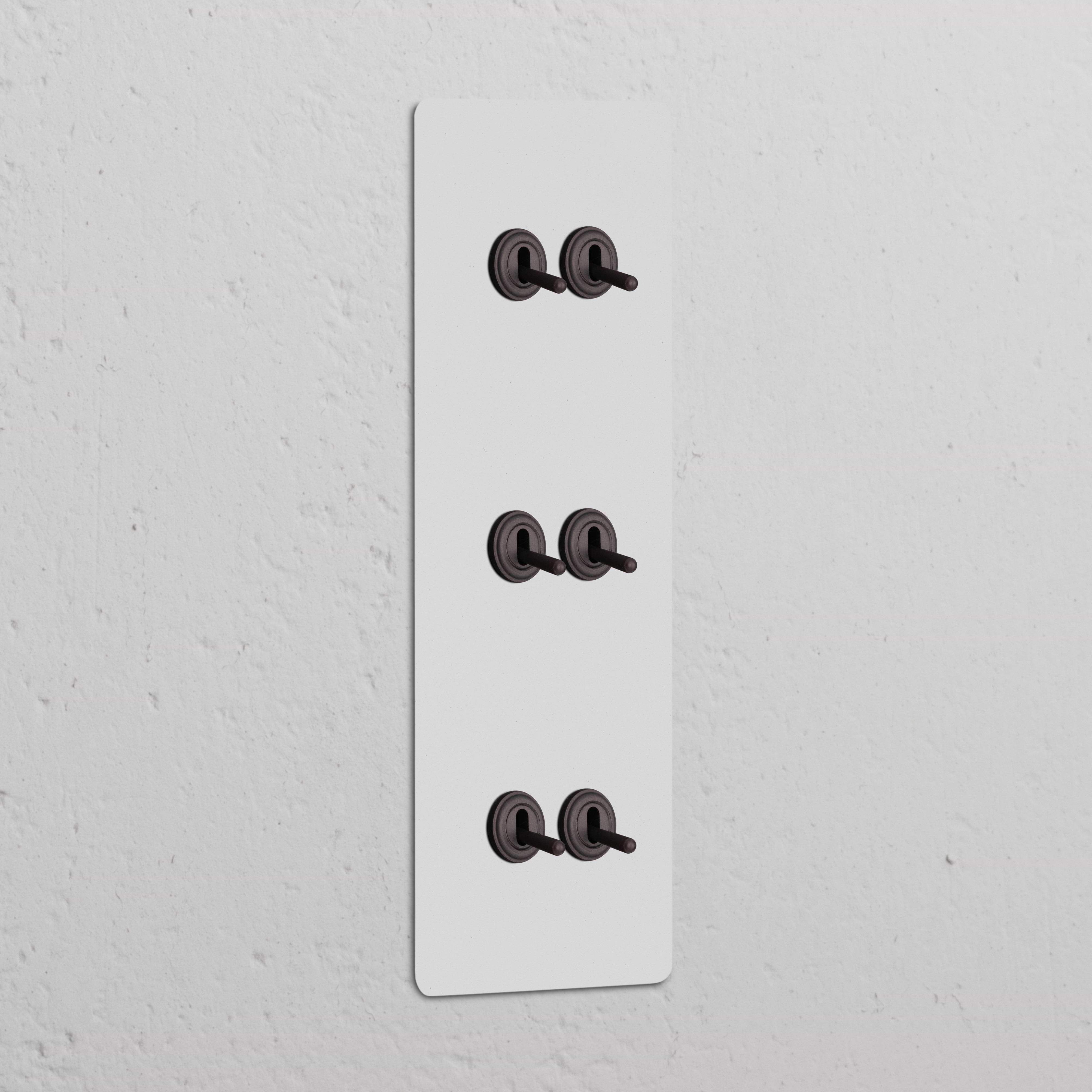 Interruttore a tripla levetta verticale, finitura Bronzo Verniciabile a 6 levette, per applicazioni Interruttori e Dimmer.