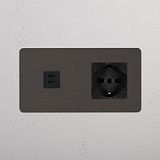 Bronzo Nero Modulo Doppio USB 30W e presa Schuko/Bipasso in design a doppio uso per il montaggio a parete.