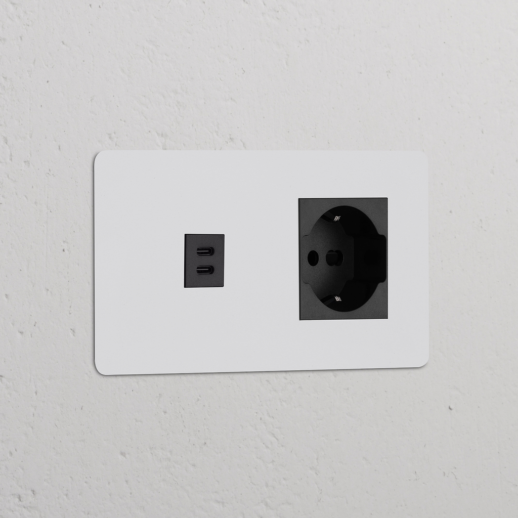 Modulo USB da 30 W e modulo di alimentazione Schuko/Bipasso; finitura verniciabile in nero, ideale per l'utilizzo con due prese.