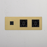 'Modulo Triplo USB 30W & 2x Schuko/Bipasso - Ottone Antico Nero' con doppia porta USB e prese in un'elegante finitura.