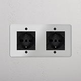 Modulo Doppio doppia presa 2x Schuko/Bipasso in Trasparente Nero su fondo bianco.