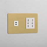 Quadro elettrico beige con finitura Ottone Antico Bianco, dotato di Modulo Doppio USB 30W e 2 prese Bipasso.