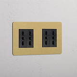 Modulo Doppio 4x Bipasso in Ottone Antico Nero, elegante modulo doppia presa per la connettività elettrica.
