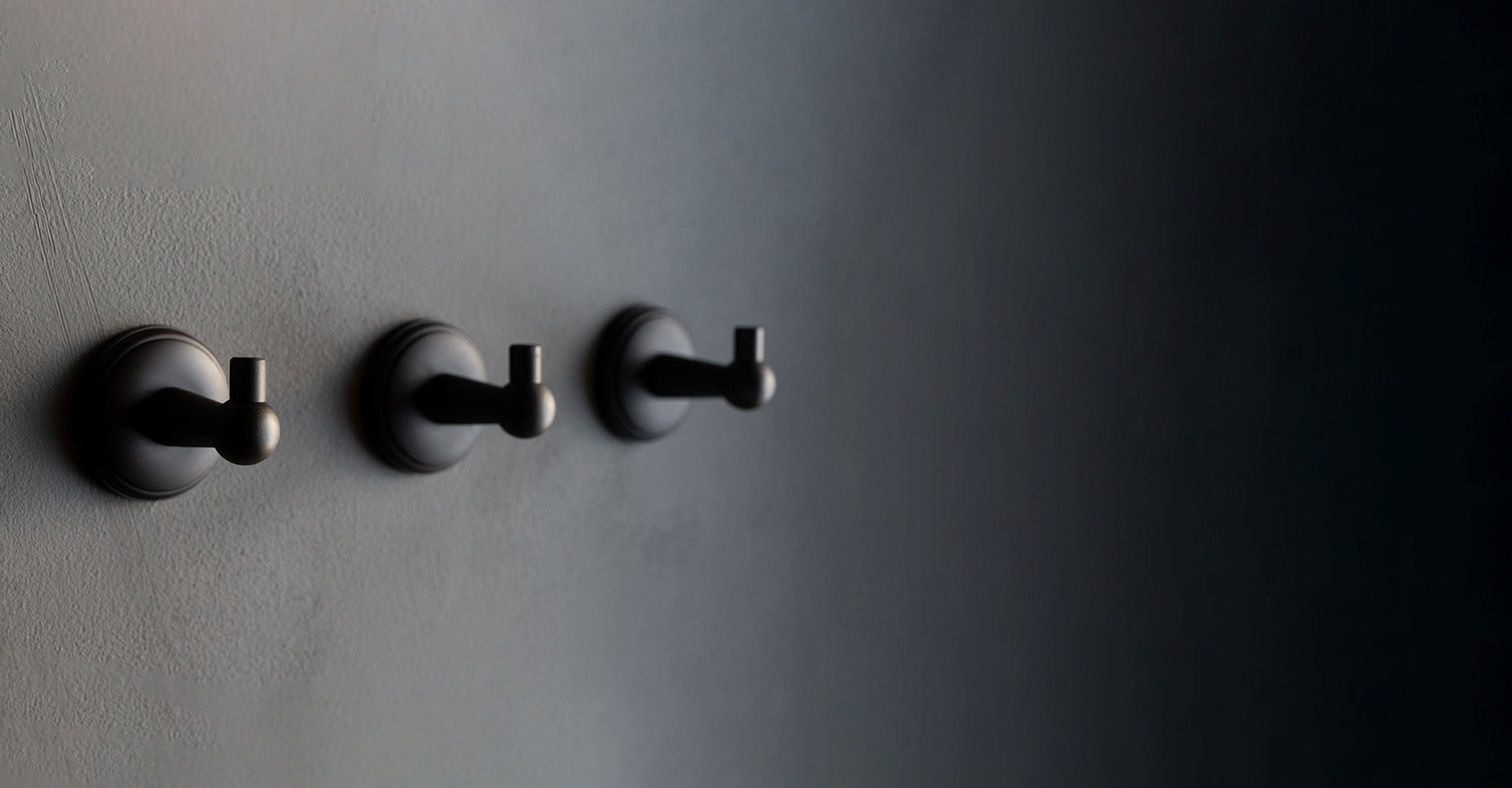 three bronze Hyde hooks by Corston