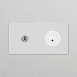 Double toggle switch with Swiss Type J power module in paintable polished nickel white on a textured wall.