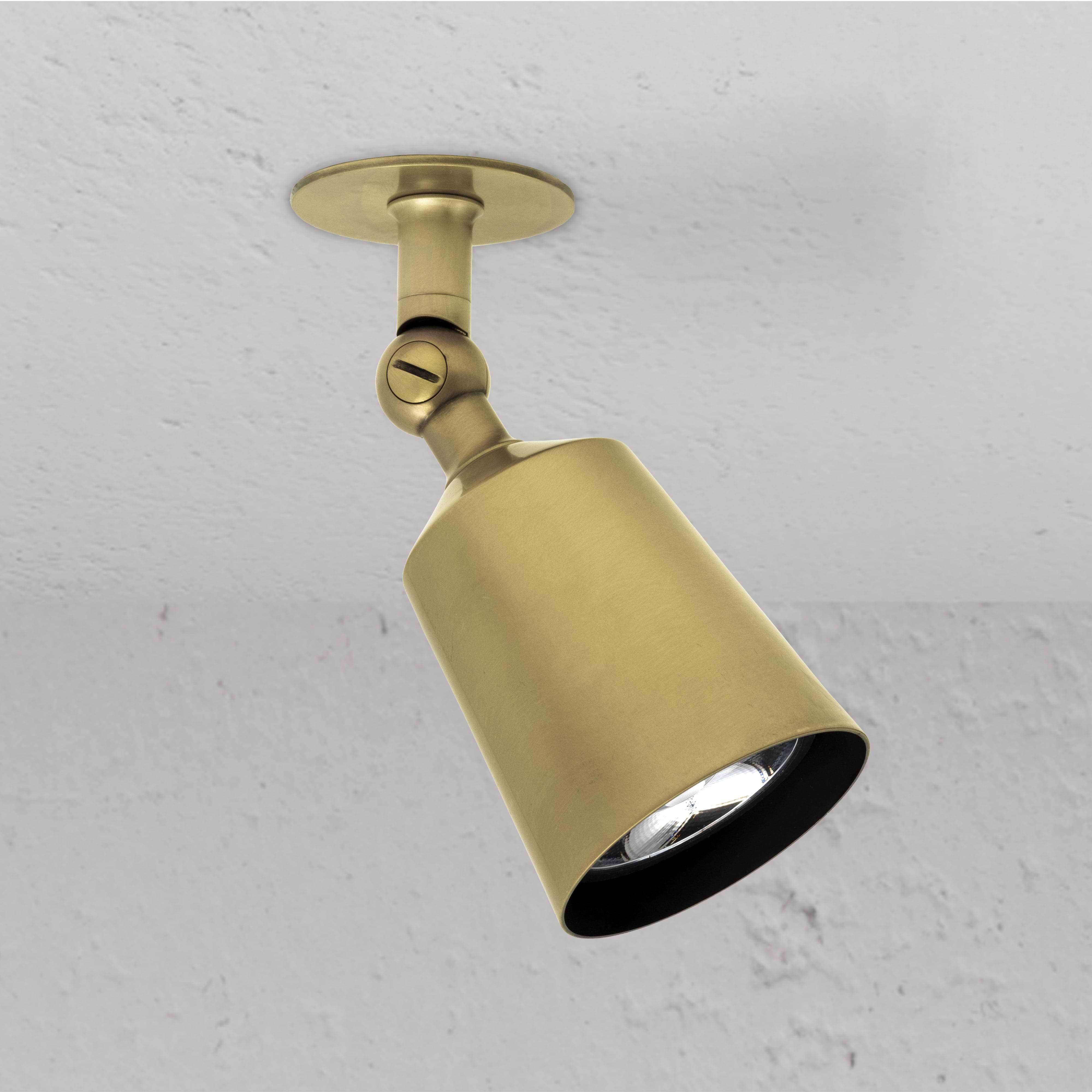 Antique Brass Designer Perryn Single Spotlight on White Background