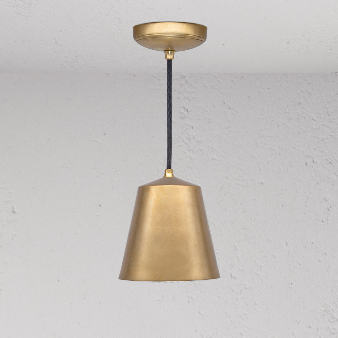 Richmond Medium Pendant Light Antique Brass Finish on White Background