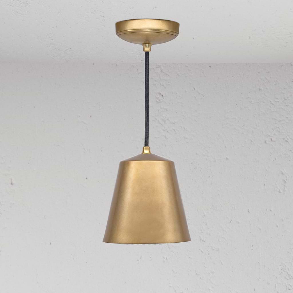 Richmond Medium Pendant Light Antique Brass Finish on White Background