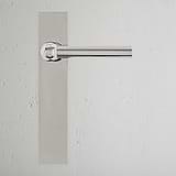 Harper Long Plate Sprung Door Handle Polished Nickel Finish on White Background Front Facing