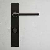 Clayton Long Plate Sprung Door Handle & Thumbturn Bronze Finish on White Background Front Facing