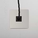 Single Cable Outlet - Polished Nickel Black on white wall plate against textured gray surface.