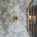 Claremont Medium Wall Light Fluted Glass Antique Brass Finish on White Background Front Facing