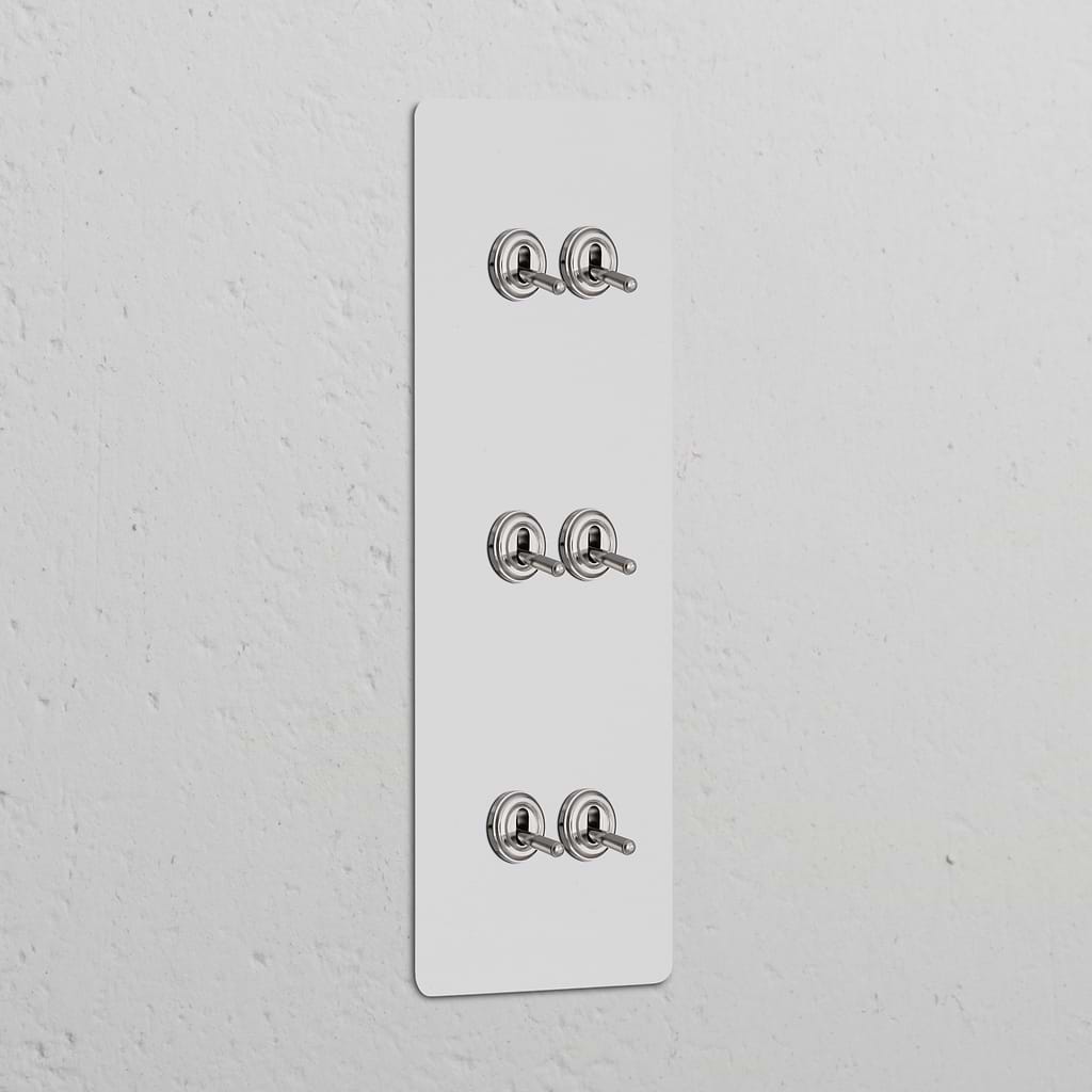 Triple 6x vertical toggle switch in polished nickel, part of the Triple Vertical Switches & Dimmers collection.