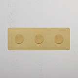 Triple 3x Multiway Dimmer Switch in antique brass, with three round dimmer knobs on a rectangular plate.