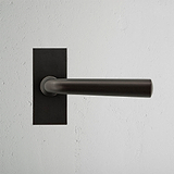 Apsley Short Plate Fixed Door Handle Bronze Finish on White Background Front Facing