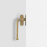 Left Southbank Internal Casement Window Handle Antique Brass Finish on White Background Front Facing